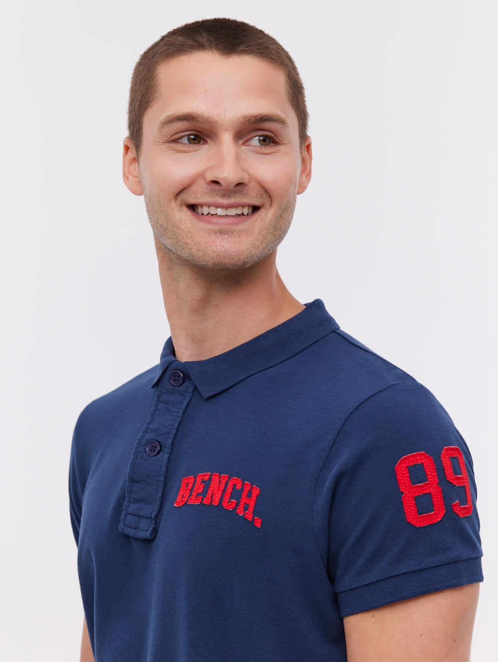 Duchal polo avec appliqué universitaire